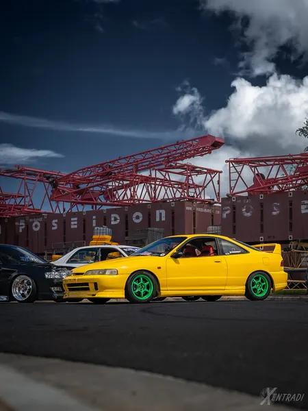 Cars — yellow coupe, green wheels