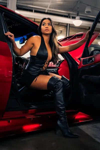 Editorial — red car, door open